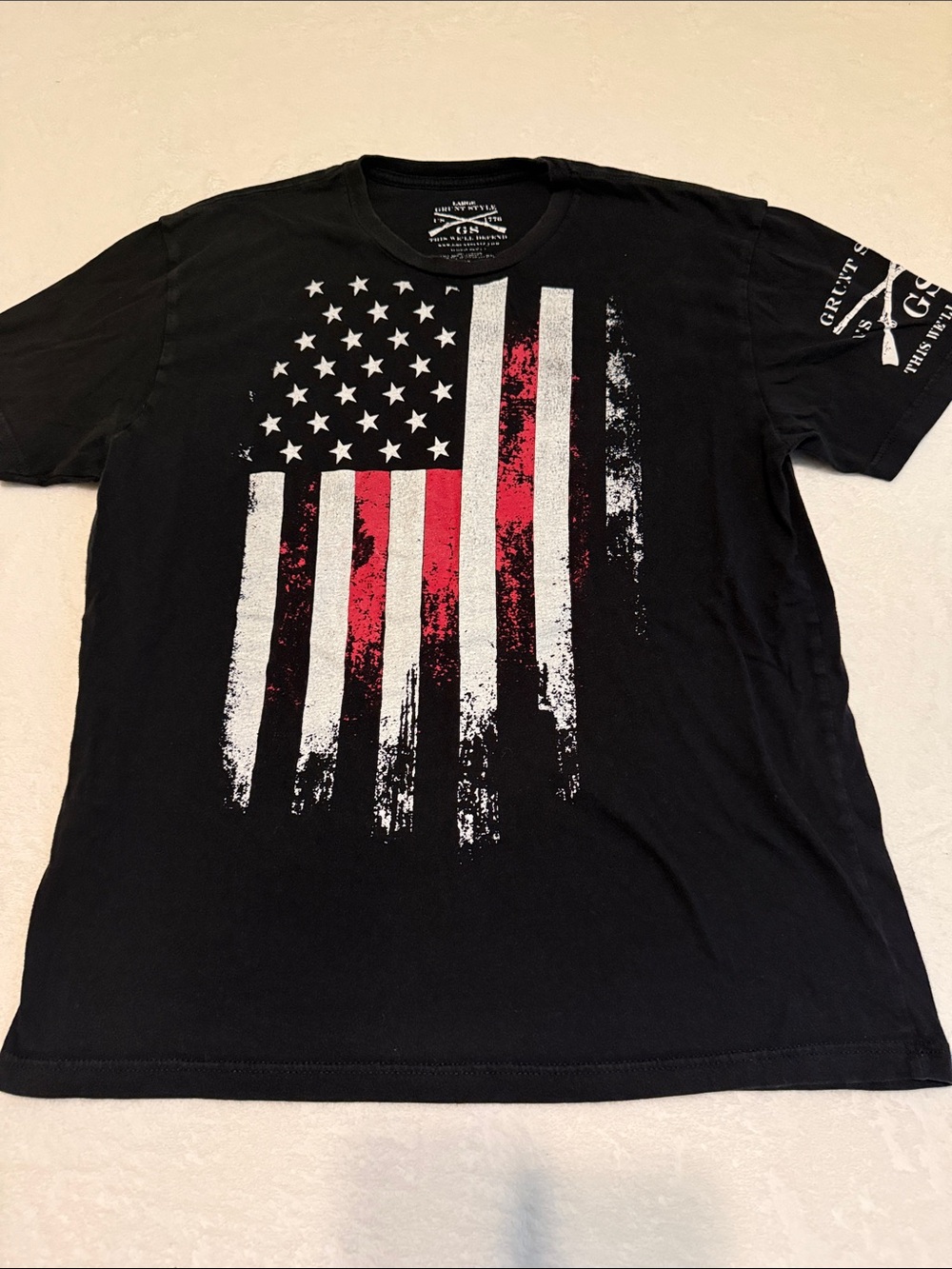 Grunt Style Black Short Sleeve Tee with Distressed White and Red Flag Graphic
